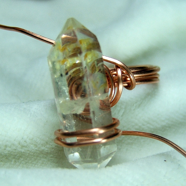How to wire wrap a quartz crystal, a long stone or a long cabochon into a simple ring - free tutorial bfrom Magpie Gemstones.