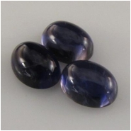 1 Iolite oval cabochon loose cut gemstone (N) Approximately 7 x 9mm