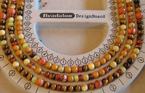 How to make a multistrand beaded necklace with gemstones.