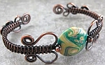 Nancy Wickman's free tutorial on how to make a woven wire bracelet.