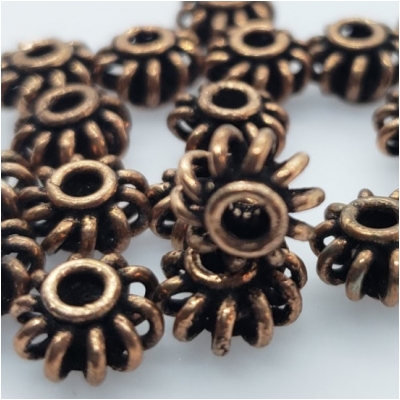 25 Copper Oxidized  Beads Approximate size 5.23 to 5.86mm x 8.46 to 8.90mm CLOSEOUT