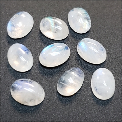 5 Rainbow Moonstone Oval Cabochon Loose Cut Gemstone (N) Approximate size 4.70 to 5.15mm x 7.03 to 7.40mm CLOSEOUT
