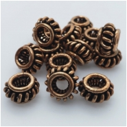 10 Copper Oxidized  Beads Approximate size 5.9 to 6.25mm x 9.75 to 10.14mm