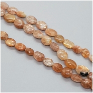 Sunstone Flat Oval Gemstone Beads (N) Approximate size 4.4 x 6mm to 6.2 x 8mm 8.25 inches CLOSEOUT