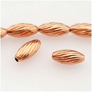 50 Copper 3 x 7mm Swirl Oval Beads Approximate size 3.25 x 7.2mm