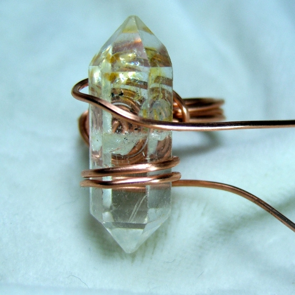 How to wire wrap a quartz crystal, a long stone or a long cabochon into a simple ring - free tutorial bfrom Magpie Gemstones.